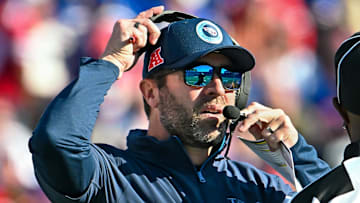 Oct 20, 2024; Orchard Park, New York, USA; Tennessee Titans head coach Brian Callahan challenges a call in the third quarter against the Buffalo Bills at Highmark Stadium. Mandatory Credit: Mark Konezny-Imagn Images