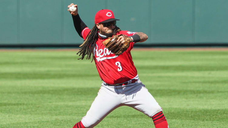 Cincinnati Reds shortstop Freddy Galvis (3) throws to first base.