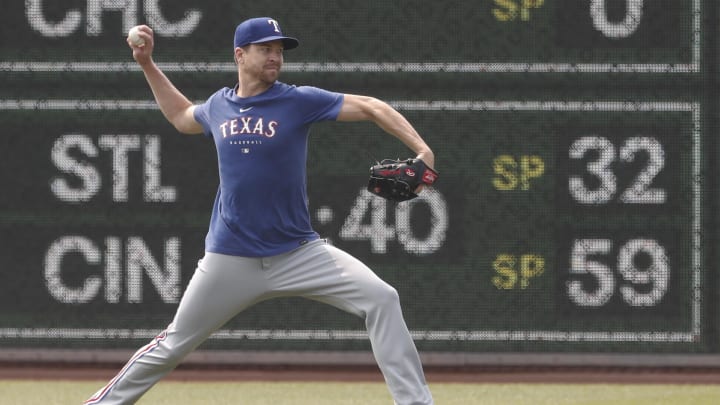 May 24, 2023; Pittsburgh, Pennsylvania, USA; Texas Rangers pitcher Jacob deGrom (48) throws in the outfield before the game against the Pittsburgh Pirates at PNC Park. 