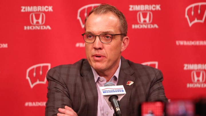 Feb 20, 2022; Madison, Wisconsin, USA; Wisconsin Badgers athletic director Chris McIntosh addresses the media about the altercation with the Michigan Wolverines team during the post-game media conference at the Kohl Center. Mandatory Credit: Mary Langenfeld-USA TODAY Sports