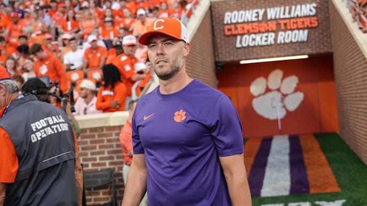 Clemson offensive coordinator Garrett Riley enters the field before the game with Clemson and Louisiana State University at Memorial Stadium in Clemson, S.C. Saturday, August 30, 2025.
