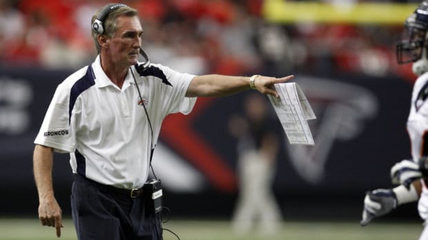 Denver Broncos head coach Mike Shanahan tries to make a point with the officials during the game against the Atlanta Falcons.