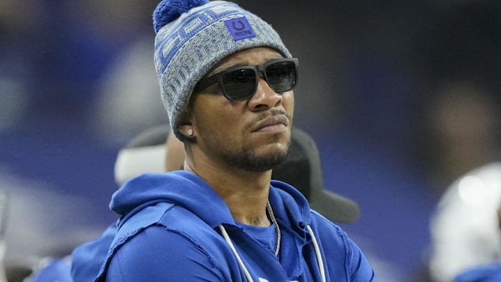 Dec 28, 2025; Indianapolis, Indiana, USA; Indianapolis Colts quarterback Anthony Richardson (5) watches the action on the field from the sidelin at Lucas Oil Stadium. 