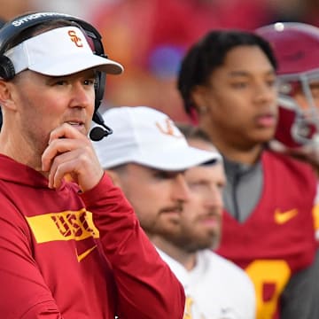 Nov 16, 2024; Los Angeles, California, USA; Southern California Trojans head coach Lincoln Riley watches game action against the Nebraska Cornhuskers during the second half at the Los Angeles Memorial Coliseum. Mandatory Credit: Gary A. Vasquez-Imagn Images