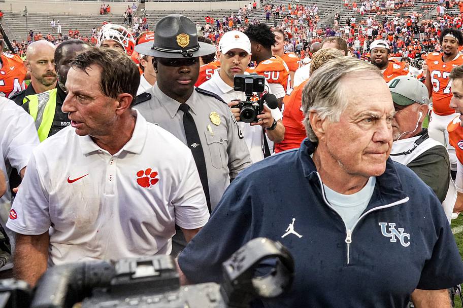 Clemson coach Dabo Swinney and North Carolina coach Bill Belichick briefly shake hands after their game Saturday.