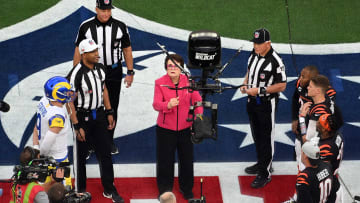 Billie Jean King tosses the coin before Super Bowl 56.