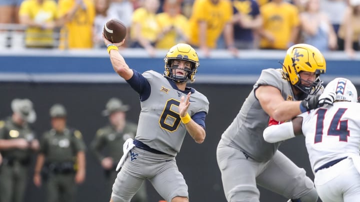 Sep 9, 2023; Morgantown, West Virginia, USA; West Virginia Mountaineers quarterback Garrett Greene (6) throws a pass during the first quarter against the Duquesne Dukes at Mountaineer Field at Milan Puskar Stadium.