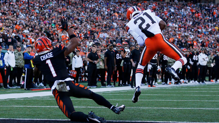 Cleveland Browns cornerback Denzel Ward (21) intercepts a pass intended for Cincinnati Bengals wide receiver Ja'Marr Chase (1) in the end zone in the first quarter of the NFL Week 9 game between the Cincinnati Bengals and the Cleveland Browns at Paul Brown Stadium in Cincinnati on Sunday, Nov. 7, 2021. Cleveland led 24-10 at halftime.

Cleveland Browns At Cincinnati Bengals Week 9