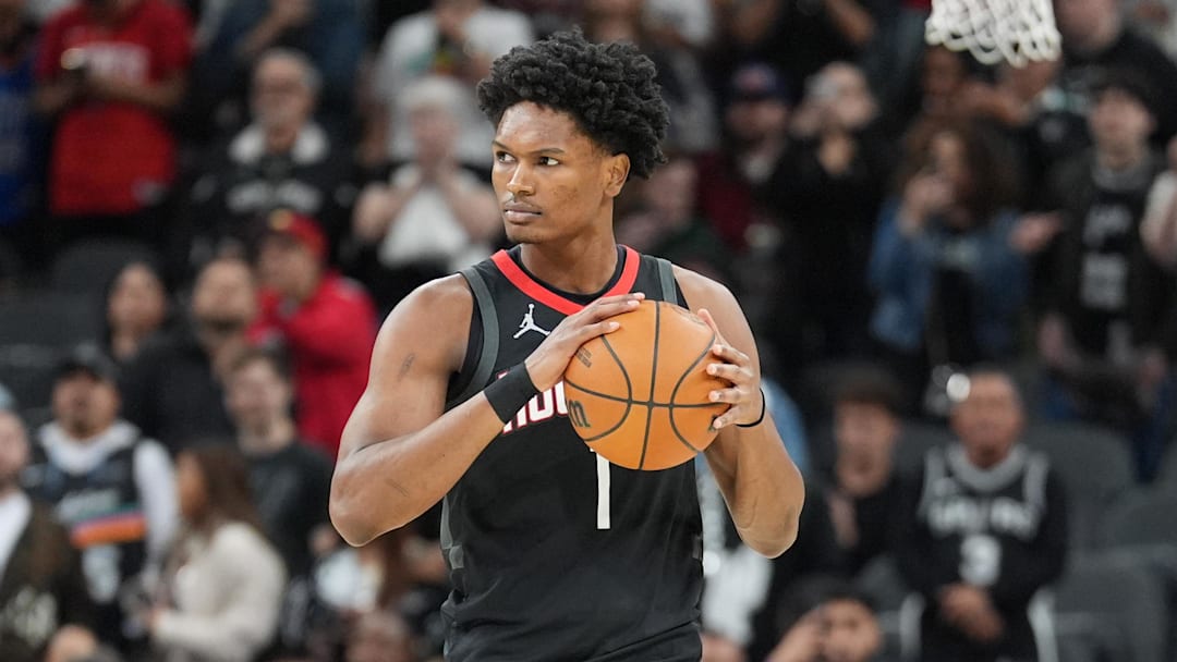 Mar 8, 2026; San Antonio, Texas, USA;  Houston Rockets guard Amen Thompson (1) holds the ball before the game against the San Antonio Spurs at Frost Bank Center. Mandatory Credit: Daniel Dunn-Imagn Images