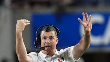 Dec 28, 2024; Orlando, FL, USA; Miami Hurricanes head coach Mario Cristobal reacts during the second half against the Iowa State Cyclones at Camping World Stadium.