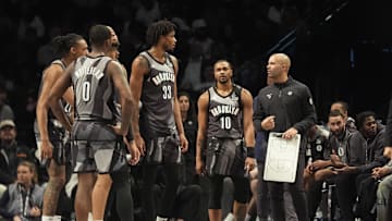 Apr 3, 2025; Brooklyn, New York, USA; Brooklyn Nets head coach Jordi Fernandez speaks to his players at a break in the action during the first half against the Minnesota Timberwolves at Barclays Center. Mandatory Credit: Gregory Fisher-Imagn Images