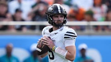 Dec 28, 2024; Orlando, FL, USA; Iowa State Cyclones quarterback Rocco Becht (3) drops back to attempt a pass against the Miami Hurricanes during the first half at Camping World Stadium. Mandatory Credit: Jasen Vinlove-Imagn Images