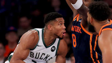 Nov 8, 2024; New York, New York, USA; Milwaukee Bucks forward Giannis Antetokounmpo (34) looks to shoot the ball against New York Knicks forward OG Anunoby (8) and center Karl-Anthony Towns (32) during the third quarter at Madison Square Garden. Mandatory Credit: Brad Penner-Imagn Images