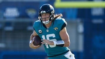Dec 1, 2024; Jacksonville, Florida, USA; Jacksonville Jaguars quarterback Trevor Lawrence (16) runs with the ball against the Houston Texans in the second quarter at EverBank Stadium. Mandatory Credit: Nathan Ray Seebeck-Imagn Images