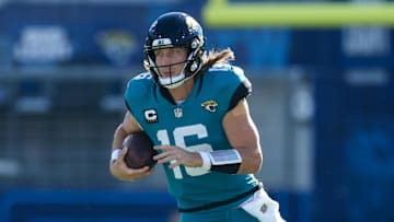 Dec 1, 2024; Jacksonville, Florida, USA; Jacksonville Jaguars quarterback Trevor Lawrence (16) runs with the ball against the Houston Texans in the second quarter at EverBank Stadium. Mandatory Credit: Nathan Ray Seebeck-Imagn Images