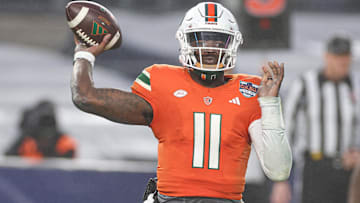 Dec 28, 2023; Bronx, NY, USA; Miami Hurricanes quarterback Jacurri Brown (11) throws the ball during