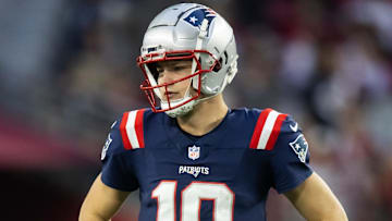 Dec 15, 2024; Glendale, Arizona, USA; New England Patriots quarterback Drake Maye (10) against the Arizona Cardinals at State Farm Stadium. Mandatory Credit: Mark J. Rebilas-Imagn Images