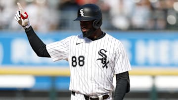 Chicago White Sox center fielder Luis Robert Jr. (88) hits a double against the Texas Rangers at Rate Field. 