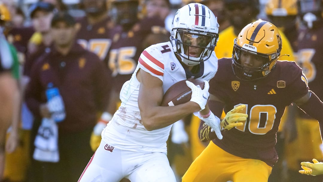 Nov 25, 2023; Tempe, Arizona, USA; Arizona Wildcats wide receiver Tetairoa McMillan (4) against the Arizona State Sun Devils in the first half of the Territorial Cup at Mountain America Stadium