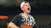Apr 7, 2025; San Antonio, TX, USA;  Florida Gators head coach Todd Golden celebrates as he cuts down the net after defeating the Houston Cougars in the national championship game of the Final Four of the 2025 NCAA Tournament at the Alamodome.