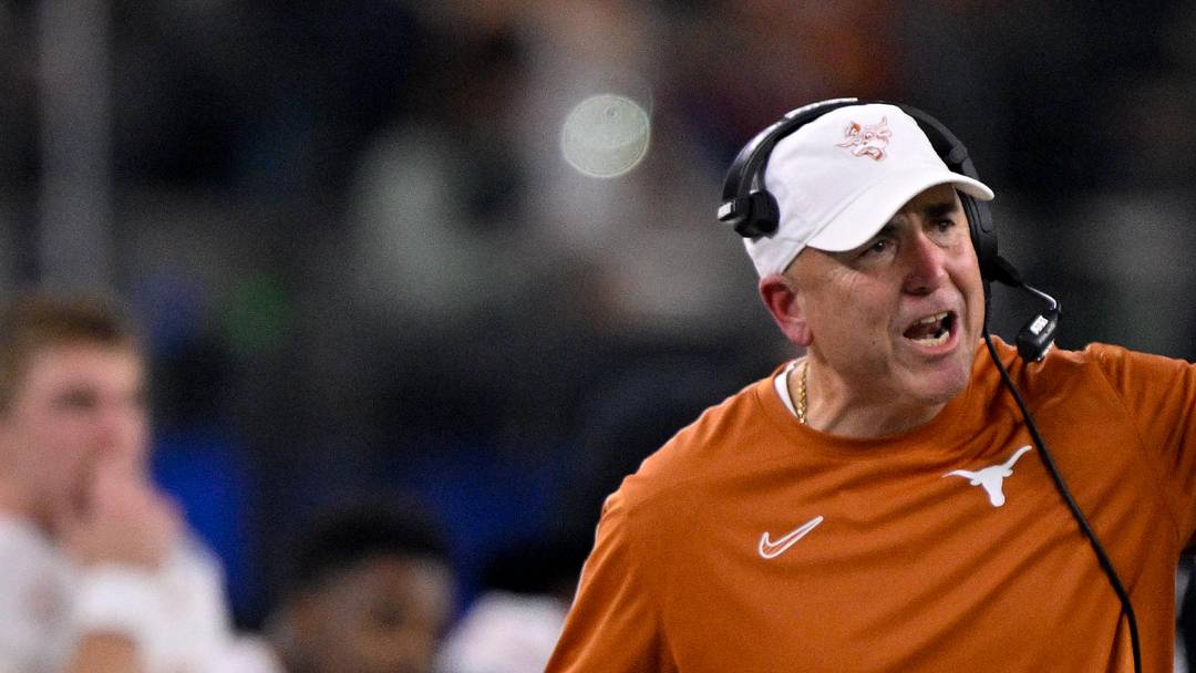 Jan 10, 2025; Arlington, TX, USA; Texas Longhorns offensive coordinator Kyle Flood during the game between the Texas Longhorns and the Ohio State Buckeyes at AT&T Stadium. Mandatory Credit: Jerome Miron-Imagn Images