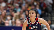 Apr 6, 2025; Tampa, FL, USA; Connecticut Huskies guard Azzi Fudd (35) dribbles the ball against the South Carolina Gamecocks during the first half of the national championship of the women's 2025 NCAA tournament at Amalie Arena. Mandatory Credit: Nathan Ray Seebeck-Imagn Images