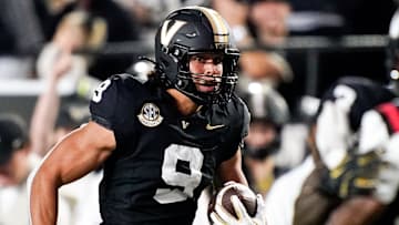 Vanderbilt tight end Eli Stowers (9) runs in a touchdown against Ball State during the second quarter at FirstBank Stadium in Nashville, Tenn., Saturday, Oct. 19, 2024.