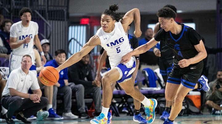 Darius Acuff Jr. brings the ball up the court for IMG Academy in their game against Richmond Heights in the City of Palms Classic on Wednesday, Dec. 20, 2023, at Suncoast Credit Union Arena in Fort Myers.