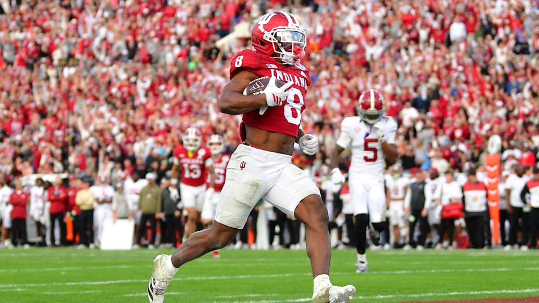 Jan 1, 2026; Pasadena, CA, USA; Indiana Hoosiers running back Kaelon Black (8) runs to score a touchdown against the Alabama Crimson Tide in the second half of the 2026 Rose Bowl and quarterfinal game of the College Football Playoff at Rose Bowl Stadium. Mandatory Credit: Gary A. Vasquez-Imagn Images