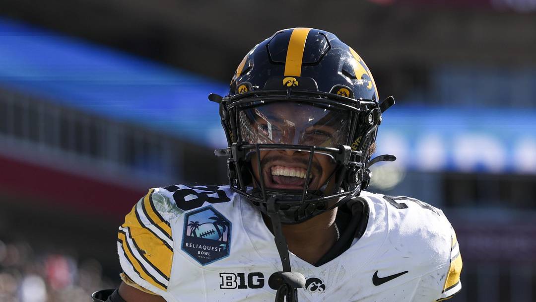 Dec 31, 2025; Tampa, FL, USA; Iowa Hawkeyes running back Kamari Moulton (28) reacts after a play against the Vanderbilt Commodores in the third quarter during the ReliaQuest Bowl at Raymond James Stadium. Mandatory Credit: Nathan Ray Seebeck-Imagn Images