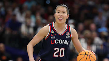 Apr 6, 2025; Tampa, FL, USA; Connecticut Huskies guard Kaitlyn Chen (20) dribbles the ball against the South Carolina Gamecocks during the first half of the national championship of the women's 2025 NCAA tournament at Amalie Arena. Mandatory Credit: Nathan Ray Seebeck-Imagn Images