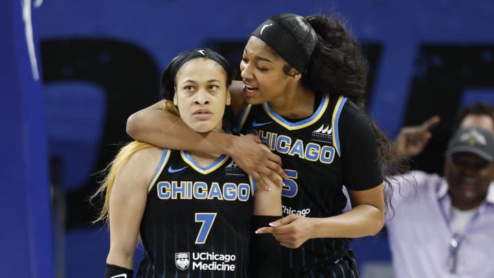 Aug 25, 2024; Chicago, Illinois, USA; Chicago Sky guard Chennedy Carter (7) reacts next to forward Angel Reese (5) after scoring against the Las Vegas Aces during the second half at Wintrust Arena. Mandatory Credit: Kamil Krzaczynski-USA TODAY Sports