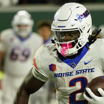 Oct 14, 2023; Fort Collins, Colorado, USA;  Boise State Broncos running back Ashton Jeanty (2) carries for a first down in the first quarter against the Colorado State Rams at Sonny Lubick Field at Canvas Stadium. Mandatory Credit: Michael Madrid-USA TODAY Sports