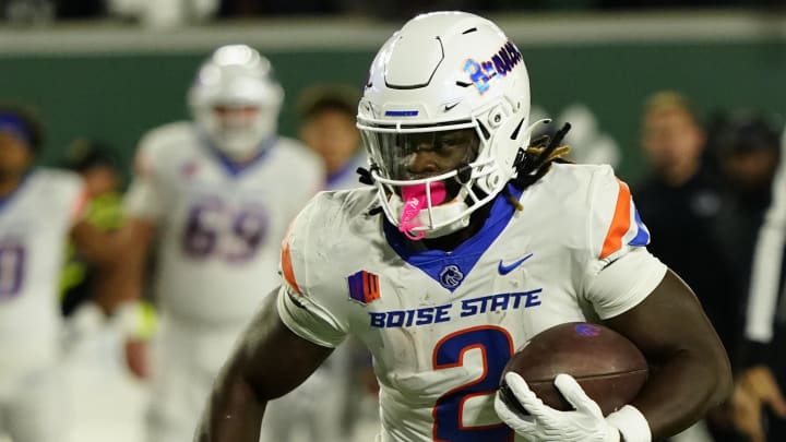 Oct 14, 2023; Fort Collins, Colorado, USA;  Boise State Broncos running back Ashton Jeanty (2) carries for a first down in the first quarter against the Colorado State Rams at Sonny Lubick Field at Canvas Stadium. Mandatory Credit: Michael Madrid-USA TODAY Sports