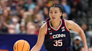 Apr 6, 2025; Tampa, FL, USA; Connecticut Huskies guard Azzi Fudd (35) dribbles the ball against the South Carolina Gamecocks during the first half of the national championship of the women's 2025 NCAA tournament at Amalie Arena. Mandatory Credit: Nathan Ray Seebeck-Imagn Images