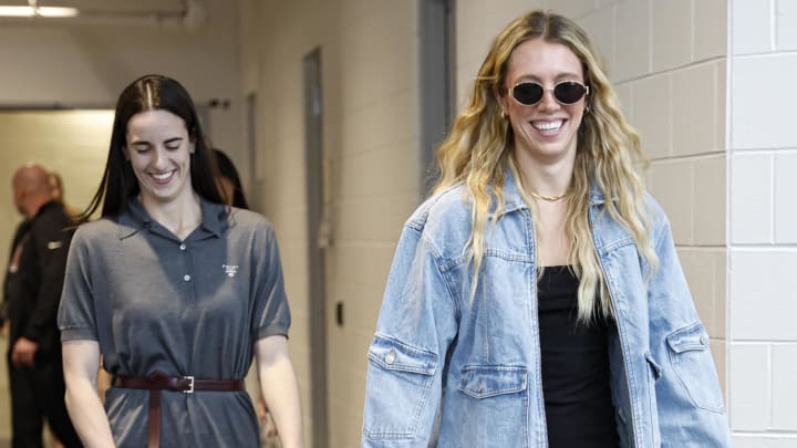 Jun 23, 2024; Chicago, Illinois, USA; Indiana Fever guard Lexie Hull (R) and guard Caitlin Clark (L) arrive at Wintrust Arena before a basketball game against the Chicago Sky. 