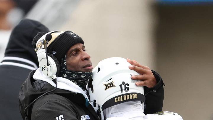 Nov 29, 2025; Manhattan, Kansas, USA; Colorado Buffaloes head coach Deion Sanders hugs Colorado Buffaloes place kicker Alejandro Mata (16) during the fourth quarter after an extra point against the Kansas State Wildcats at Bill Snyder Family Football Stadium. Mandatory Credit: Scott Sewell-Imagn Images