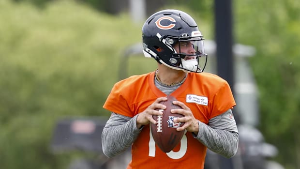 Chicago Bears quarterback Caleb Williams (18) looks to pass the ball during minicamp
