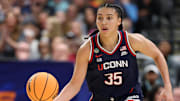 Apr 6, 2025; Tampa, FL, USA; Connecticut Huskies guard Azzi Fudd (35) dribbles the ball against the South Carolina Gamecocks during the first half of the national championship of the women's 2025 NCAA tournament at Amalie Arena. Mandatory Credit: Nathan Ray Seebeck-Imagn Images