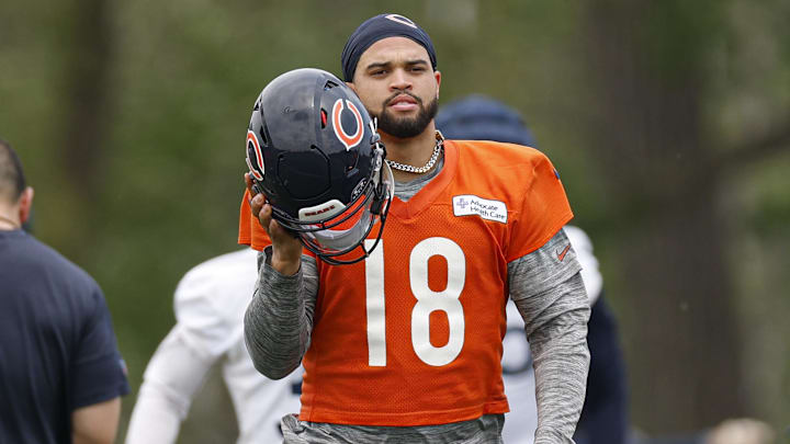 Jun 3, 2025; Lake Forest, IL, USA; Chicago Bears quarterback Caleb Williams (18) warms up during minicamp at Halas Hall. Mandatory Credit: Kamil Krzaczynski-Imagn Images