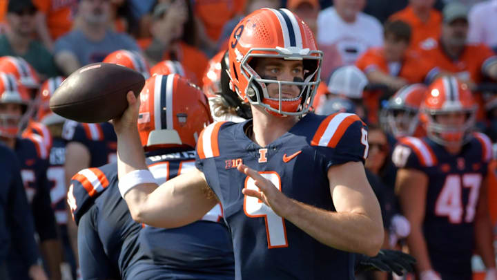Oct 12, 2024; Champaign, Illinois, USA; Illinois Fighting Illini quarterback Luke Altmyer (9) passes the ball in the first half against the Purdue Boilermakers at Memorial Stadium. Mandatory Credit: Ron Johnson-Imagn Images Oct 12, 2024; Champaign, Illinois, USA; Illinois Fighting Illini quarterback Luke Altmyer (9) passes the ball in the first half against the Purdue Boilermakers at Memorial Stadium. Mandatory Credit: Ron Johnson-Imagn Images