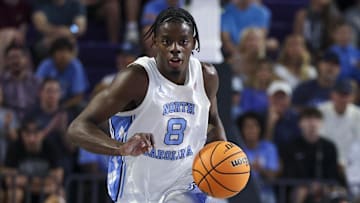 Nov 25, 2025; Fort Myers, Florida, USA; North Carolina Tar Heels forward Caleb Wilson (8) controls the ball against the St. Bonaventure Bonnies in the first half at Suncoast Credit Union Arena. Mandatory Credit: Nathan Ray Seebeck-Imagn Images