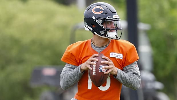 Chicago Bears quarterback Caleb Williams (18) looks to pass the ball during minicamp