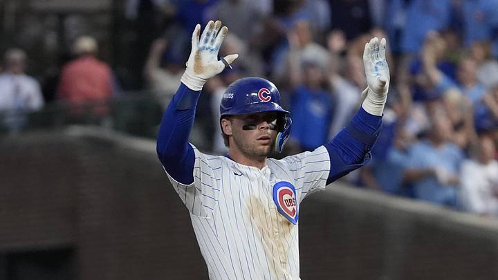 Oct 2, 2025; Chicago, Illinois, USA; Chicago Cubs second base Nico Hoerner (2) celebrates his double against the San Diego Padres during game three of the Wildcard round for the 2025 MLB playoffs at Wrigley Field. Mandatory Credit: David Banks-Imagn Images