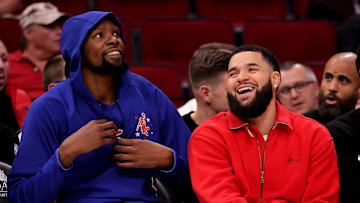 Nov 12, 2025; Houston, Texas, USA; Houston Rockets forward Kevin Durant (7) sits next to Houston Rockets guard Fred VanVleet (5, red) on the bench against the Washington Wizards during the fourth quarter at Toyota Center. Mandatory Credit: Erik Williams-Imagn Images