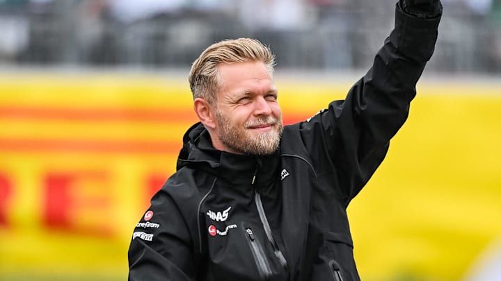 Jun 18, 2023; Montreal, Quebec, CAN; Haas F1 Team driver Kevin Magnussen (DEN) parades and salutes the crowd before the Canadian Grand Prix at Circuit Gilles Villeneuve. Mandatory Credit: David Kirouac-Imagn Images