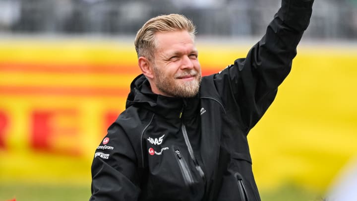 Jun 18, 2023; Montreal, Quebec, CAN; Haas F1 Team driver Kevin Magnussen (DEN) parades and salutes the crowd before the Canadian Grand Prix at Circuit Gilles Villeneuve. Mandatory Credit: David Kirouac-USA TODAY Sports