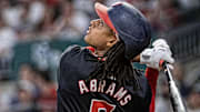 Aug 23, 2024; Cumberland, Georgia, USA; Washington Nationals shortstop CJ Abrams (5) watches the ball hit against Atlanta Braves in the air during the tenth inning at Truist Park