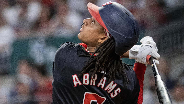 Aug 23, 2024; Cumberland, Georgia, USA; Washington Nationals shortstop CJ Abrams (5) watches the ball hit against Atlanta Braves in the air during the tenth inning at Truist Park