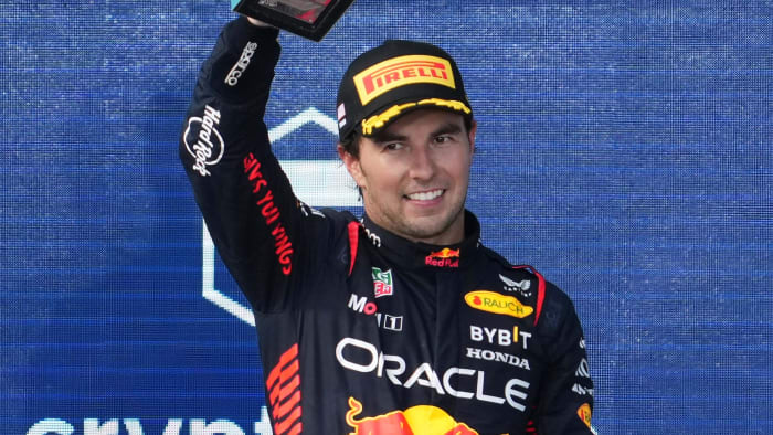 May 7, 2023; Miami Gardens, Florida, USA; Red Bull driver Sergio Perez (11) of Mexico celebrates on